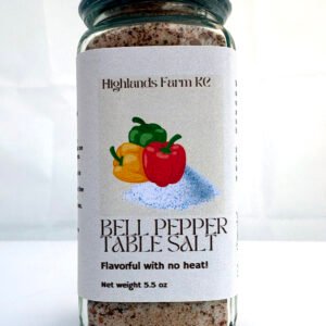 Product image of bell pepper table salt in a square glass jar with a label and a silver bottle top with safety wrap