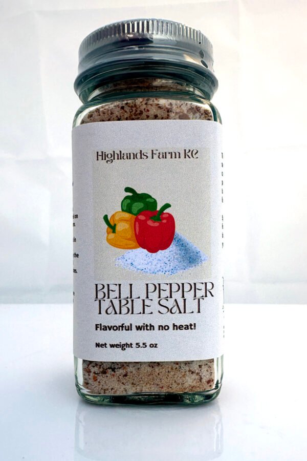 Product image of bell pepper table salt in a square glass jar with a label and a silver bottle top with safety wrap